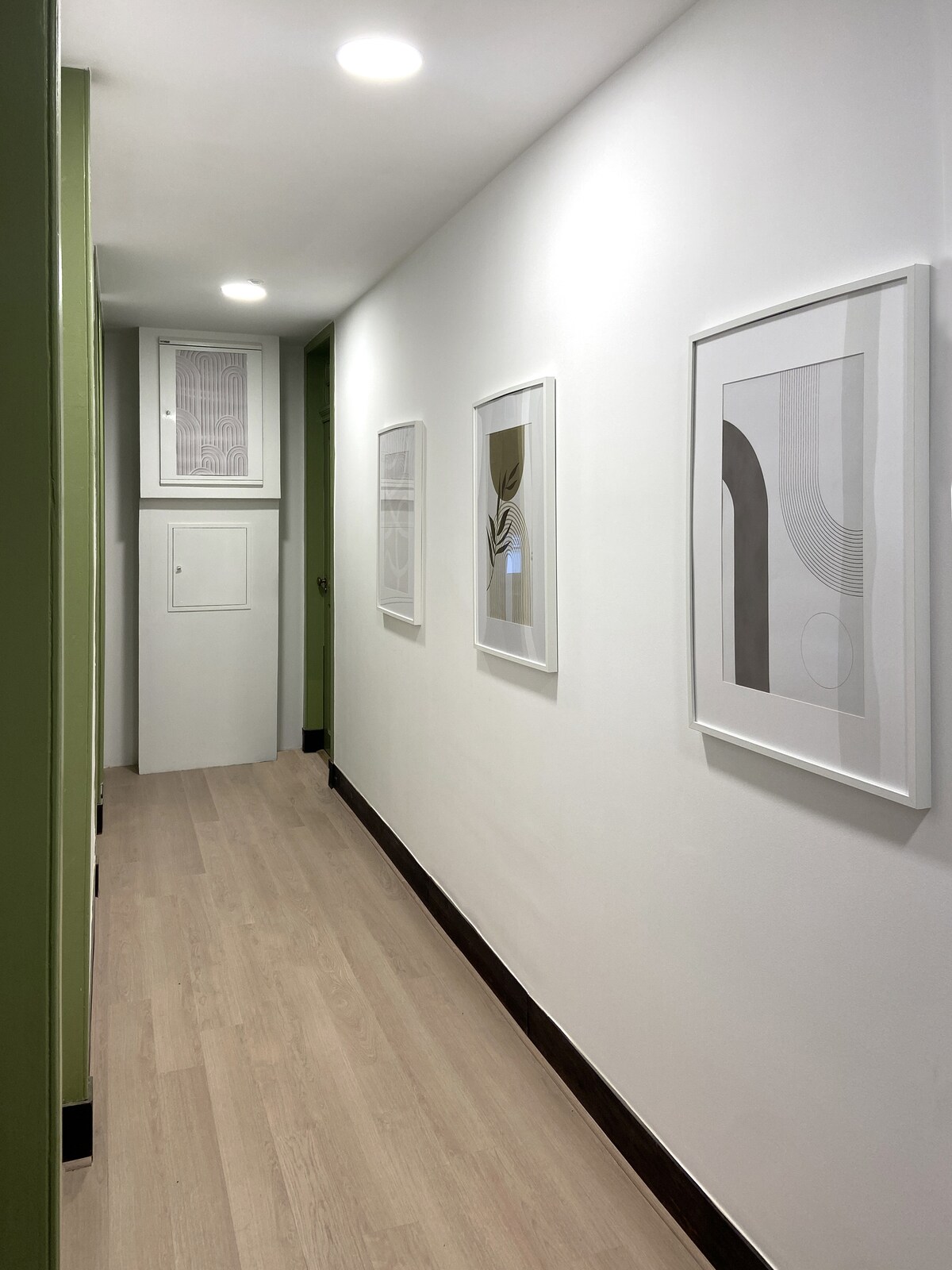 Modern hallway with framed art