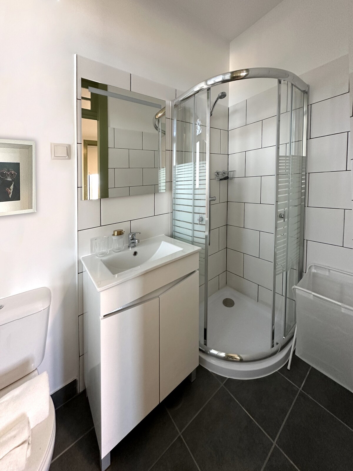 Bathroom with rounded shower